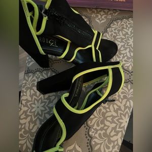 Size 9 worn once heeled sandal black and neon green trim
